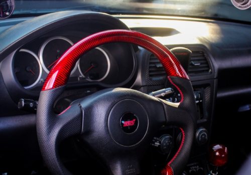 Galaxy Customs - Subaru STi - Red Carbon Fiber and Leather